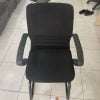 Ghế chân quỳ cũ có tay vịn bọc vải màu đen