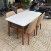 Bộ bàn ăn mặt đá 4 ghế bọc da